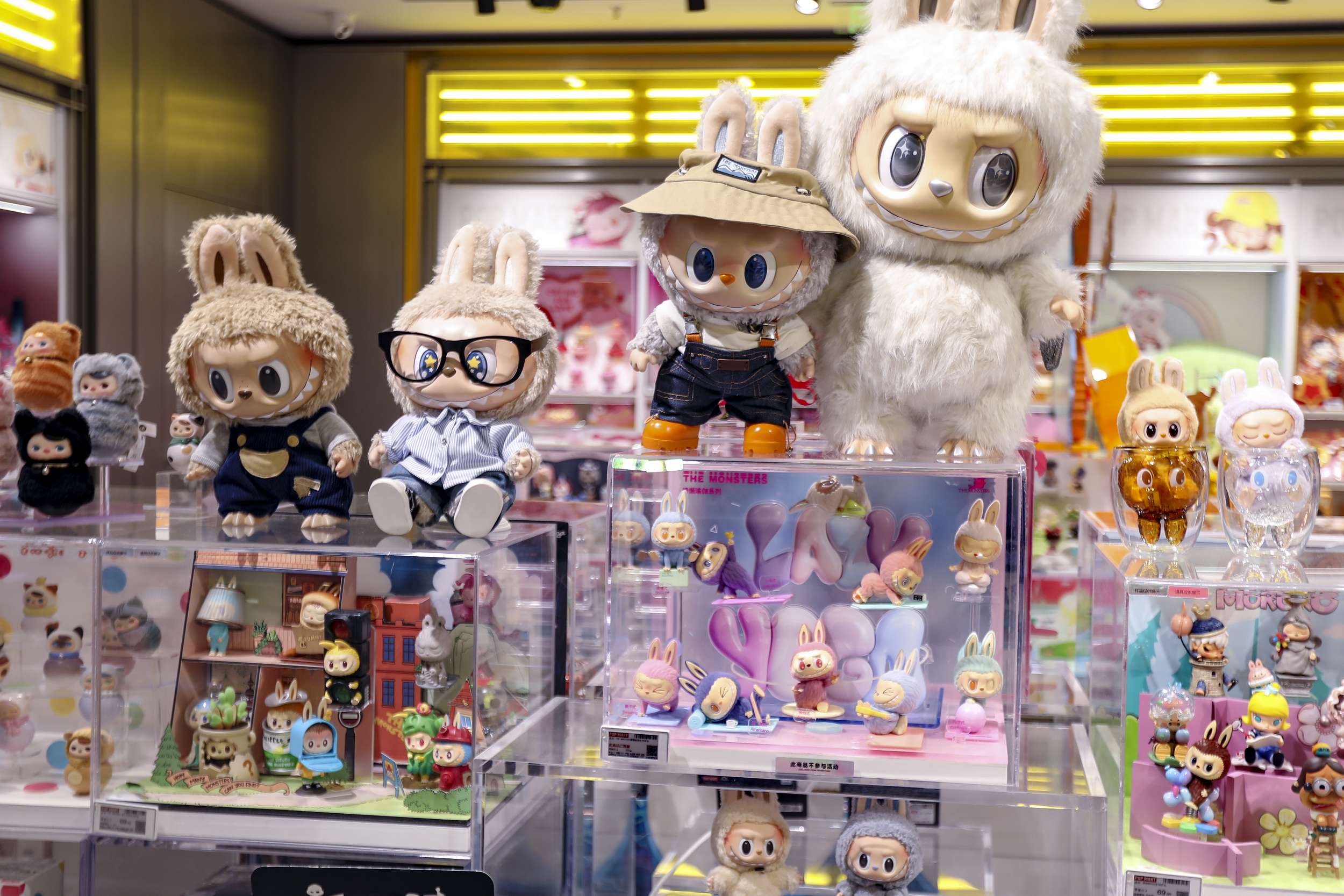 SHANGHAI, CHINA - JUNE 09: Labubu figures and dolls are seen on display at a Pop Mart store on June 9, 2025 in Shanghai, China. From Southeast Asia and Europe to the United States and the Middle East, Labubu - the beloved character from Chinese toy company Pop Mart - is taking the world by storm. (Photo by VCG/VCG via Getty Images)
